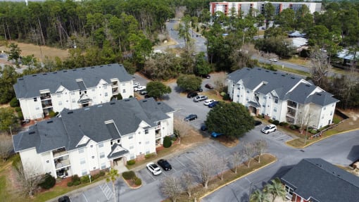 an aerial view of houses in a neighborhood at The Fountains Apartments, Pensacola, Florida, 32514